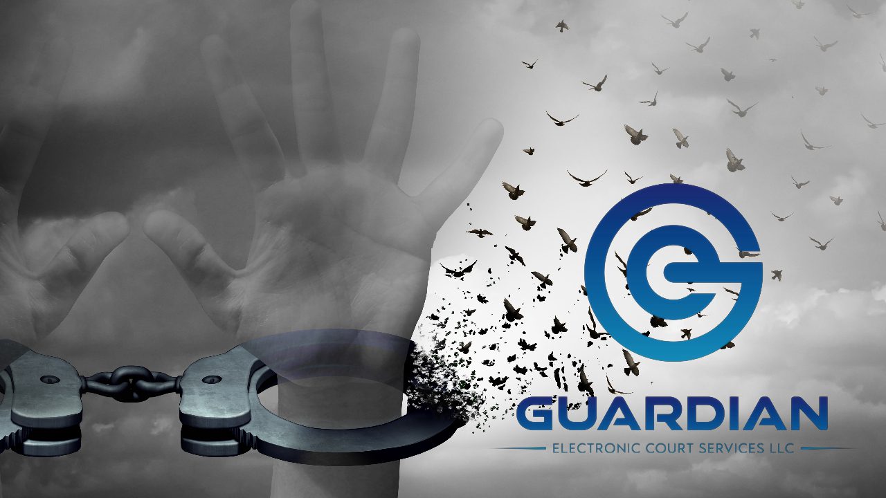 A hand is held up in front of the logo for guardex.